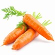 A detailed close-up of three carrots placed on a plain white background - isolated raw food.