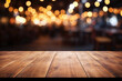A wooden table in front of a restaurant with a bokeh background. High quality photo