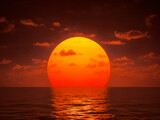 Fototapeta Na sufit - The sky is set on fire, and the sun is shining brightly, casting light on the sea.
