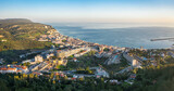 Fototapeta Tulipany - Drone aerial view on Sesimbra, fishing town in Setubal district in Portugal.