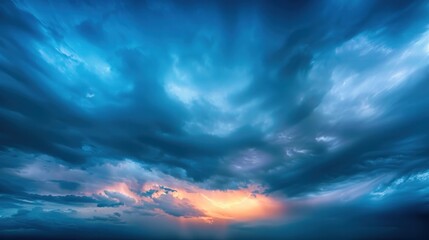 Wall Mural - blurred blue sky with clouds the sky has dramatic storms and dark clouds. lightning flashes above th
