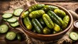 Bowl with pickled gherkins, cucumbers on wooden background close up