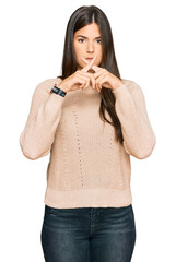 Sticker - Young brunette woman wearing casual winter sweater rejection expression crossing fingers doing negative sign