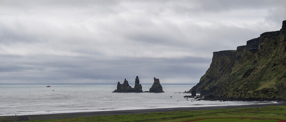 Wall Mural - View to the rock formation reynisdrangar in vik i myrdal on iceland 