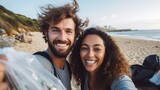 Fototapeta Do akwarium - A man and woman are smiling at the camera on a beach