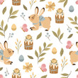 Seamless pattern with hand-drawn Bunnies, Easter cakes, flowers and leaves. Printing on fabric wrapping paper.