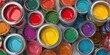 Paint cans with colors on white background.