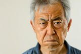 Fototapeta  - 怒っている顔のシニアの日本人男性（おじいさん・おじいちゃん・イライラ・不満・ストレス）