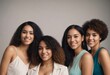 © prasanth - portrait of young multiracial women standing together and smiling