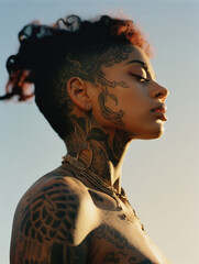 Wall Mural - Beautiful african american woman with tattoo on body and face outdoors