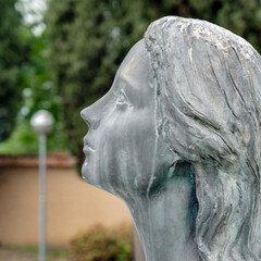 Wall Mural - Sad woman statue