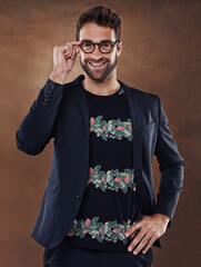 Poster - Fashion, eyewear and portrait of male person, studio and clothing isolated on background. Confident, pose and glasses for happy man model, contemporary and trendy outfit for startup business owner