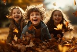 Fototapeta Do akwarium - Children playing in a leaf pile