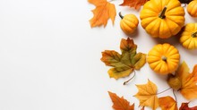 Autumn Background With Pumpkins And Leaves On White Background
