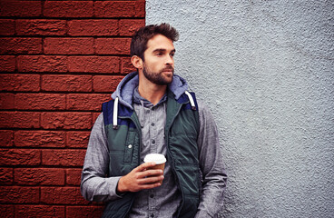 Poster - Fashion, wall or man with coffee thinking of casual clothes, style or edgy hoodie for winter outdoor outfit. Tea, cool model or stylish person in urban town in streetwear or trendy jacket in Italy