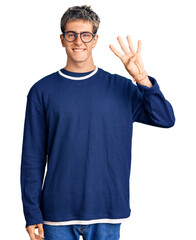 Wall Mural - Young handsome man wearing casual clothes and glasses showing and pointing up with fingers number four while smiling confident and happy.