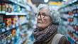 Concerned elderly woman comparing food prices amid rising inflation in a grocery store