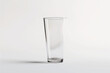Empty pint glass against a white background