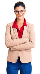 Poster - Young beautiful woman wearing business shirt and glasses happy face smiling with crossed arms looking at the camera. positive person.