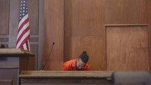 Black Man On Trial Sitting Down On The Stand