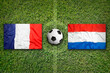 France vs. Netherlands flags on soccer field