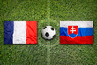 France vs. Slovakia flags on soccer field