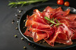 Prosciutto crudo, Italian salami, parma ham. Antipasto plate.
