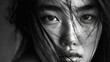 attractive young asian female / woman's face, Intense eye contact, high key lighting, black and white picture, 16:9