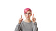 © Simon C - Portrait of a woman with short pink hair isolated on transparent background pointing up