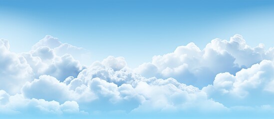 Wall Mural - a stunning azure sky dotted with fluffy white cumulus clouds creating a picturesque natural landscap