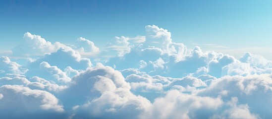 Wall Mural - the vast expanse of the sky is painted with a beautiful shade of blue, adorned with fluffy white cum