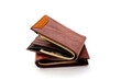 Brown wallets on white background.