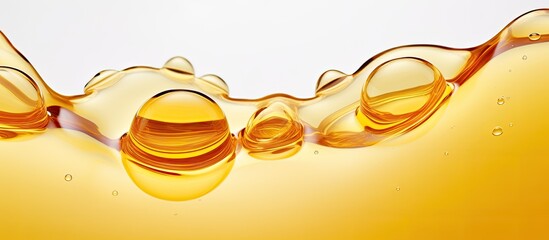 Wall Mural - A close up of ambercolored liquid with bubbles in a drinkware on a white background, reminiscent of tequila or cognac. Perfect for vision care or eye glass accessory advertisements