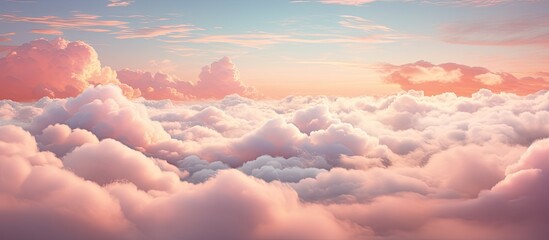 Wall Mural - the view of the cumulus clouds from above at sunset creates a breathtaking natural landscape, with r