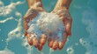 On a light blue background, hands are bathed in soap foam