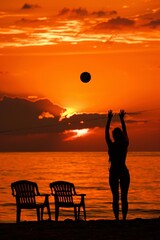 Wall Mural - a silhouette of a woman playing beach volleyball against the backdrop of orange sky and sea