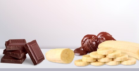 Canvas Print - Tasty sweet Chocolate with fresh Sliced Bananas