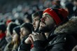 Disheartened football fans show sadness and dismay in stands after team's loss. Concept Football Fans, Sad Reactions, Disappointed Supporters, Stands Emotions, Team Defeat