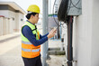 © offsuperphoto - male worker checking electrical control panel in the factory