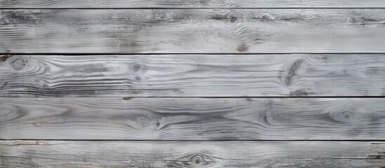 Poster - A detailed close up of a monochrome grey hardwood wall with a unique pattern of rectangular planks, resembling a piece of art in monochrome photography