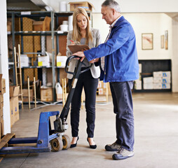 Poster - Woman, man and clipboard for inspection in warehouse, distribution and logistics industry with conversation. Checklist, inventory management and pallet jack for boxes with supply chain and storage