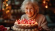 elderly woman with birthday cake