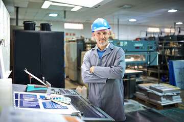 Aufkleber - Portrait, confident and manager in factory with machine for printing, equipment maintenance and production supervisor. Male person and industrial warehouse for manufacturing or distribution of paper.