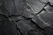 Black slate background or texture,  Black stone wall with cracks and scratches