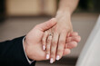 Hand in hand. Certification and marriage proposal. Gentle manicure on beautiful hands