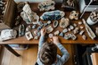 kid organizing a collection of rocks and fossils on a spacious desk