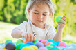 Happy Baby Coloring Easter Eggs