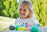Fototapeta Morze - Happy Baby Coloring Easter Eggs
