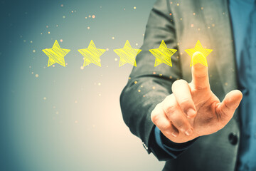 Poster - Close up of businessman hand pointing at 5 star rating on blurry background. Customer service and excellent feedback concept.
