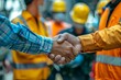 © Anastasiia - Engineer team demonstrating cooperation and teamwork through a successful project handshake. Concept Teamwork, Engineering, Success, Project Management, Handshake